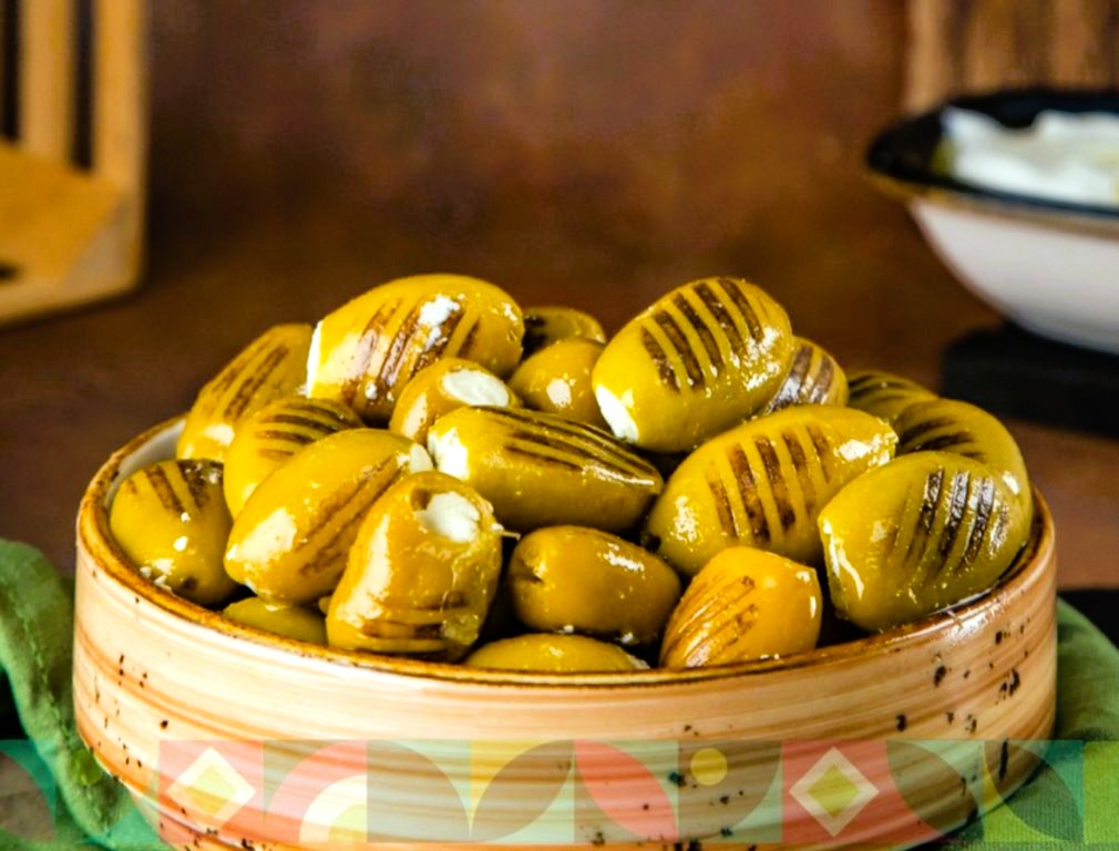 Grilled Green Olives Stuffed With Labnah Dipped in Olive Oil