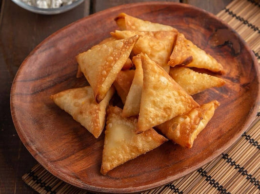 Frozen Samosa Stuffed with Mixture Of Cheese Ready For Frying