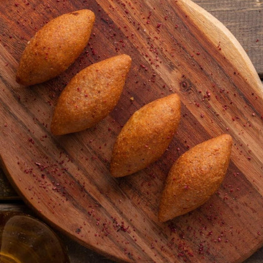 Frozen Kibbeh Stuffed With Chicken Musakhan Ready For Frying